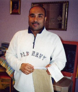 Ricardo's Dad With Cheque