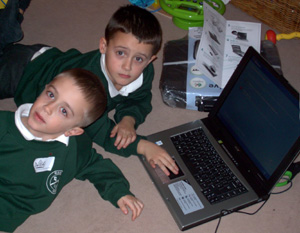 Bryony's brothers with their new laptop