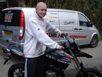 Jacob with his new Motorbike