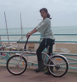 Sofia on her new bike at the seafront